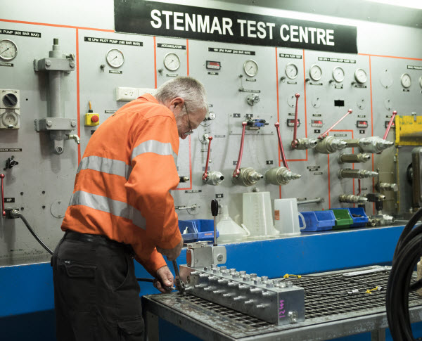 Man working inside a system test centre