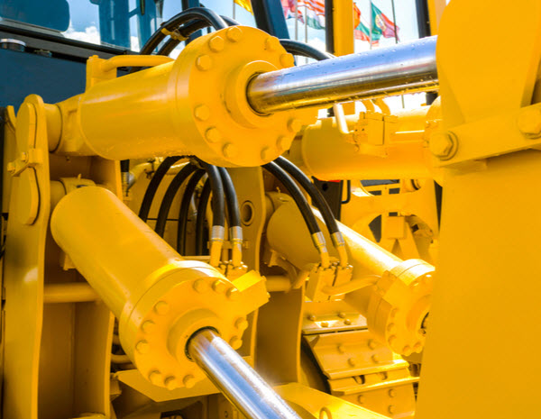 Yellow hydraulic cylinders